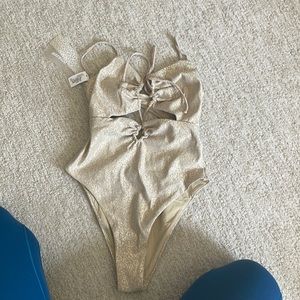 Brand new with tags Devon Windsor one piece. Champagne / gold color.